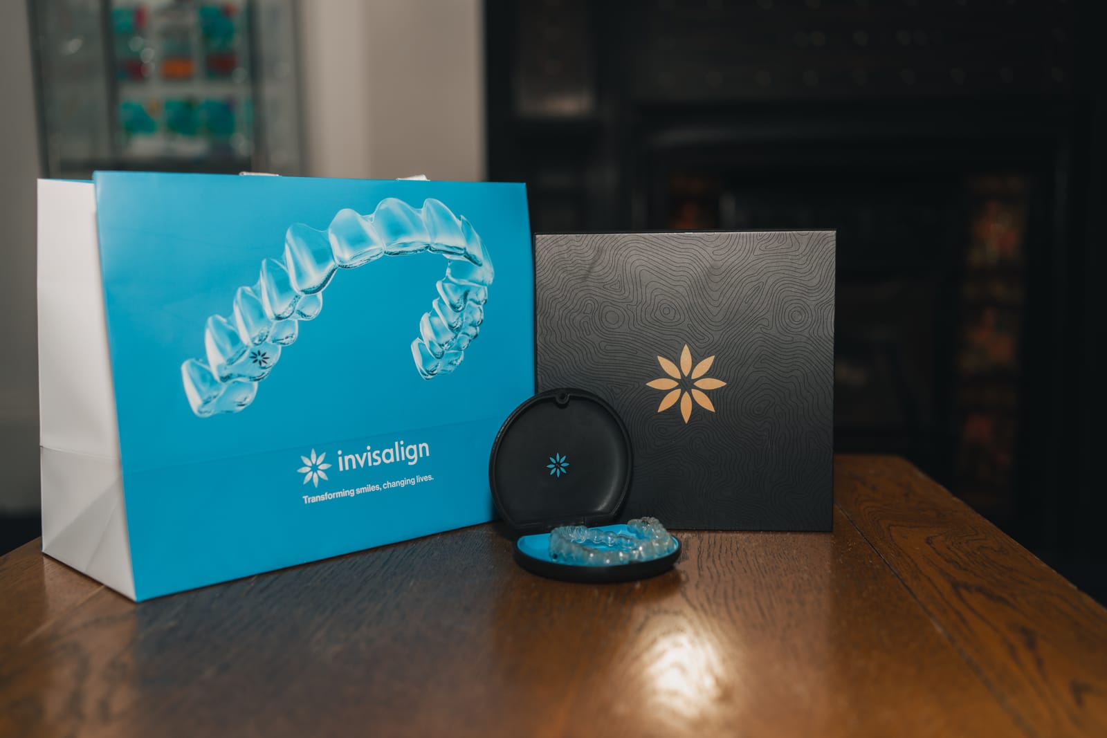 Invisalign aligners in their box and carry case
